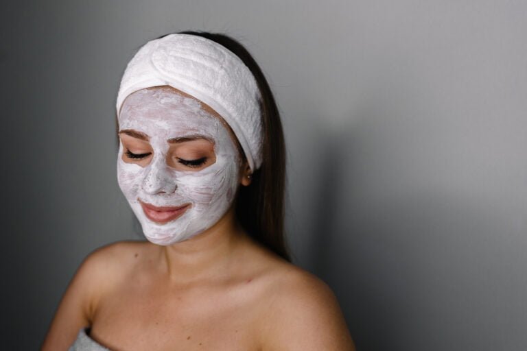 beauty women getting facial mask